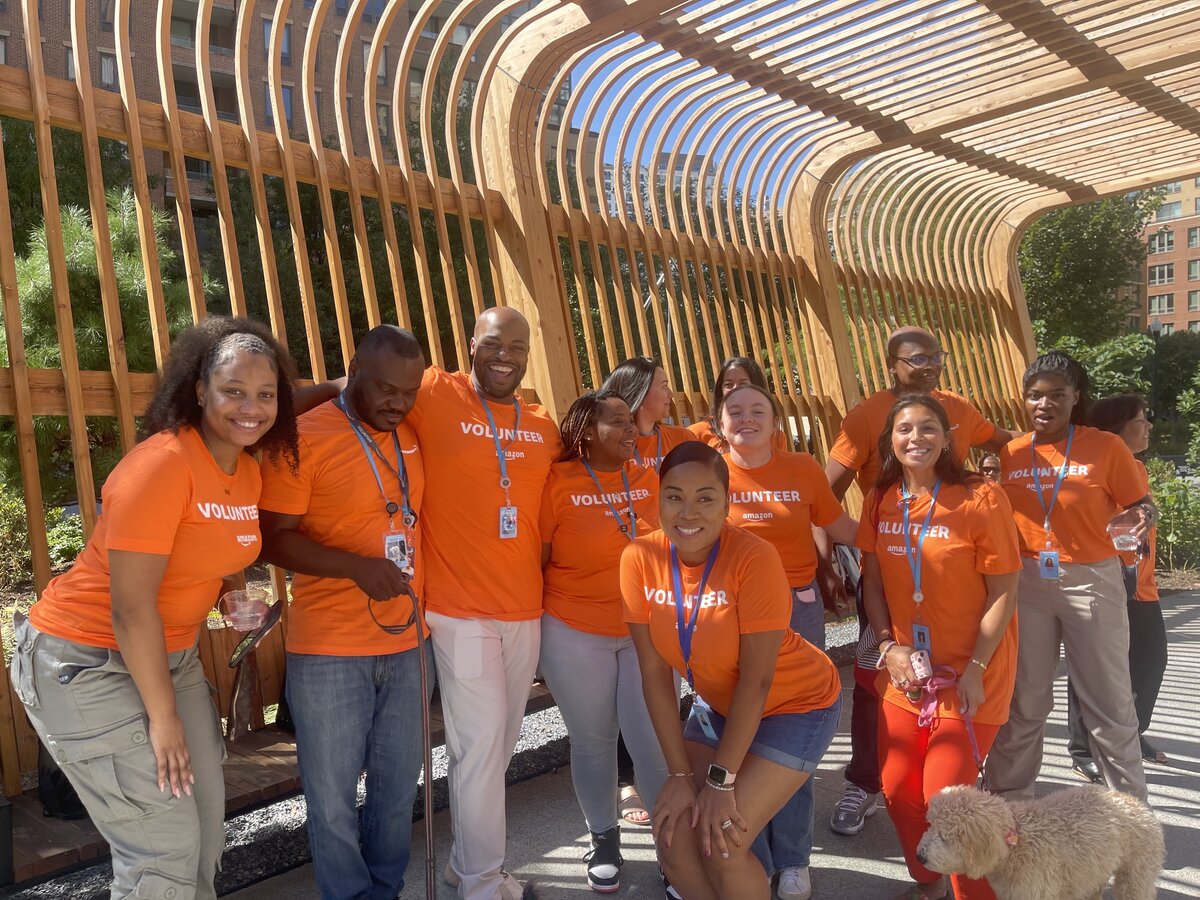 Lucius Williams and his AWS team volunteering together at a community event