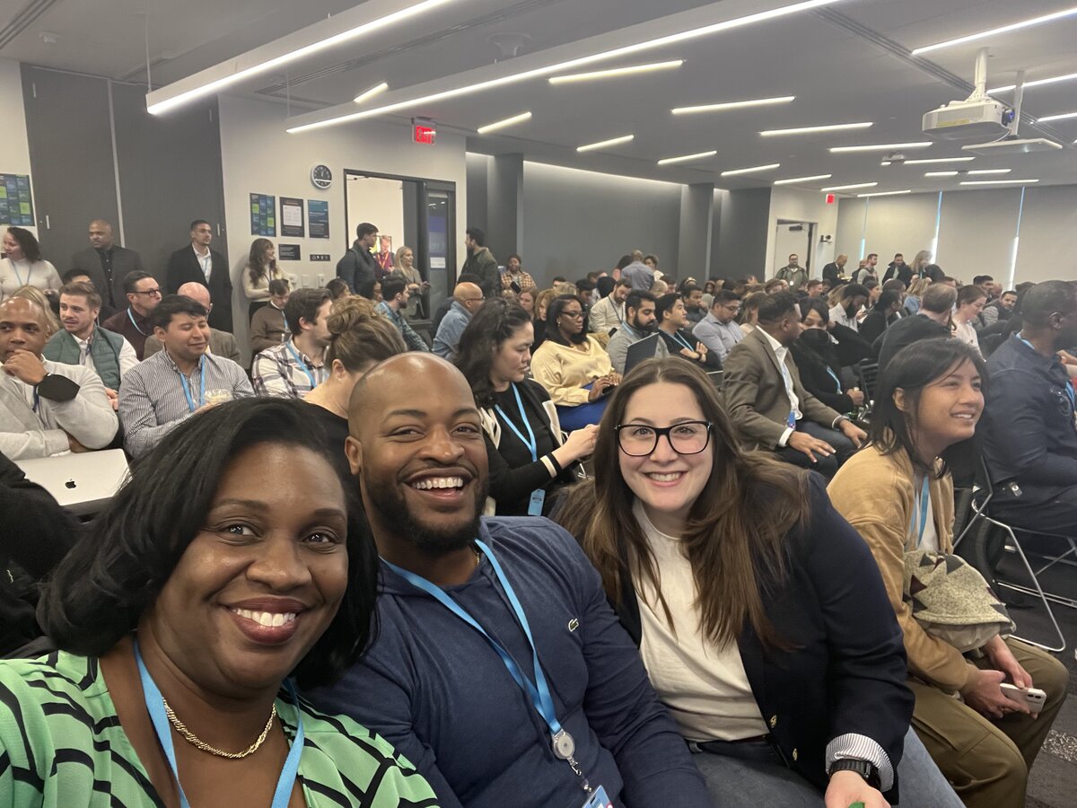 Lucius Williams leading a team all-hands meeting at AWS