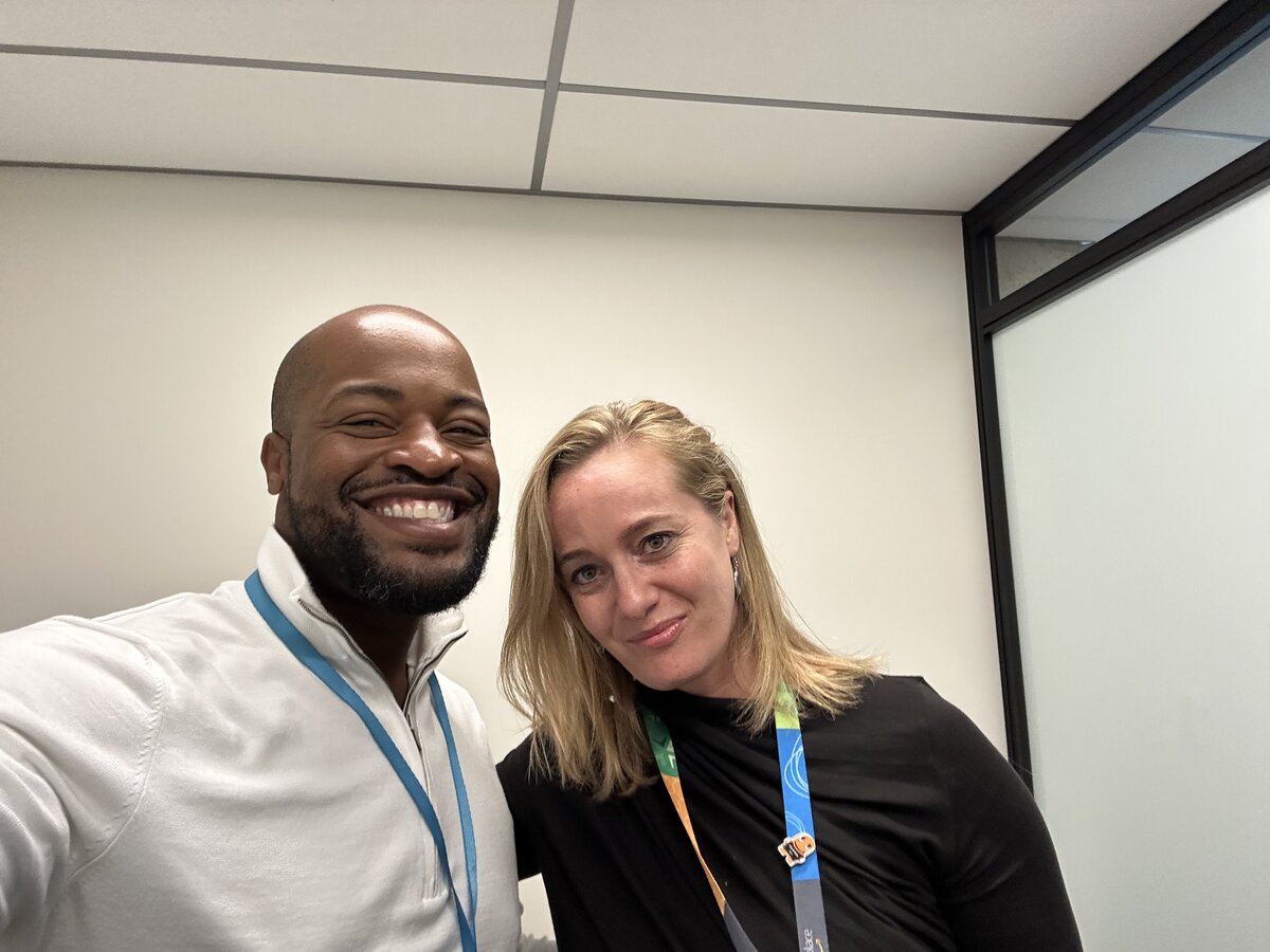 Lucius Williams with a colleague at a work event